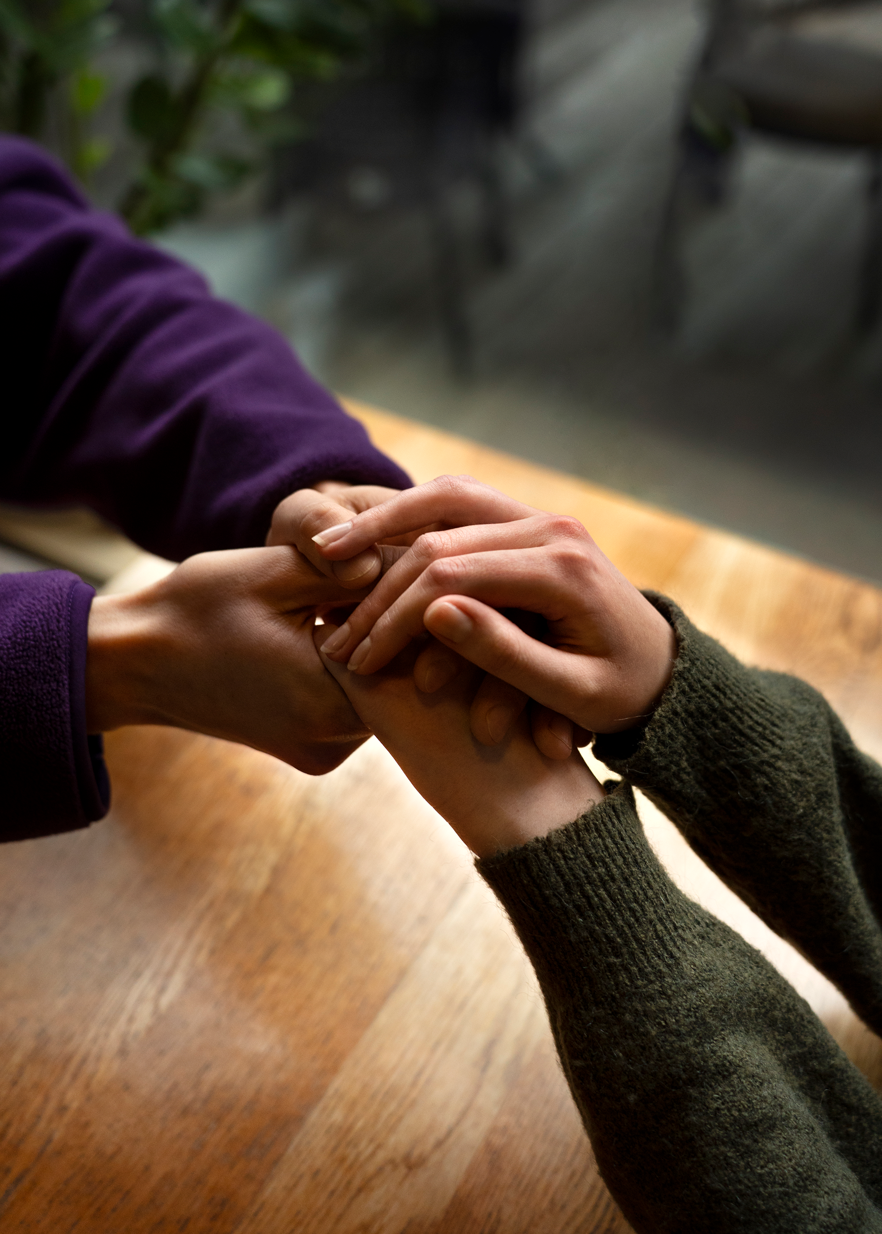 hands holding each other support
